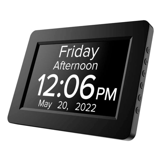 A digital dementia clock displaying the time, date, and day of the week on its screen, with a black frame (Image 1).
