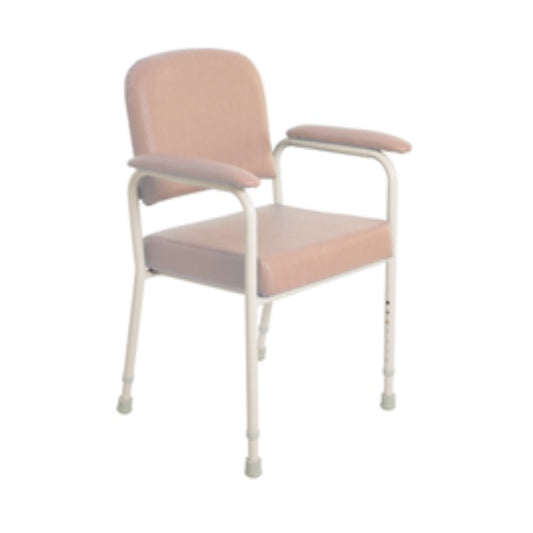 A low back classic day chair with beige upholstery and a metal frame, height adjustable with armrests from Adaptive Equipment (Image 1).