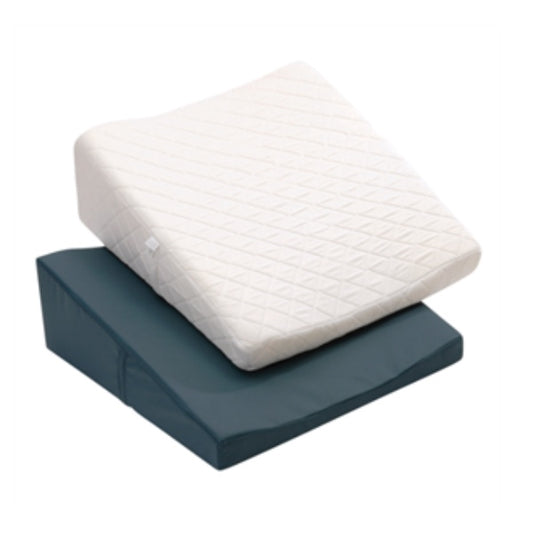 A white contoured bed wedge with a quilted cover on top of a grey base - Contoured Bed Wedge with Quilted Cover | Adaptive Equipment.