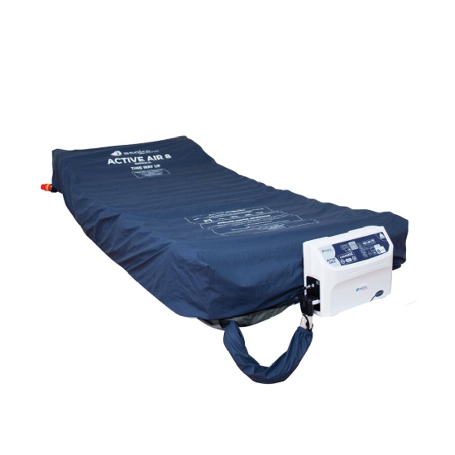 An alternating air mattress designed for pressure relief, showing the mattress itself and the digital pump connected to it (Image 3).