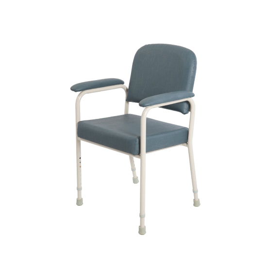A low back classic day chair with beige upholstery and a metal frame, height adjustable with armrests from Adaptive Equipment (Image 2).