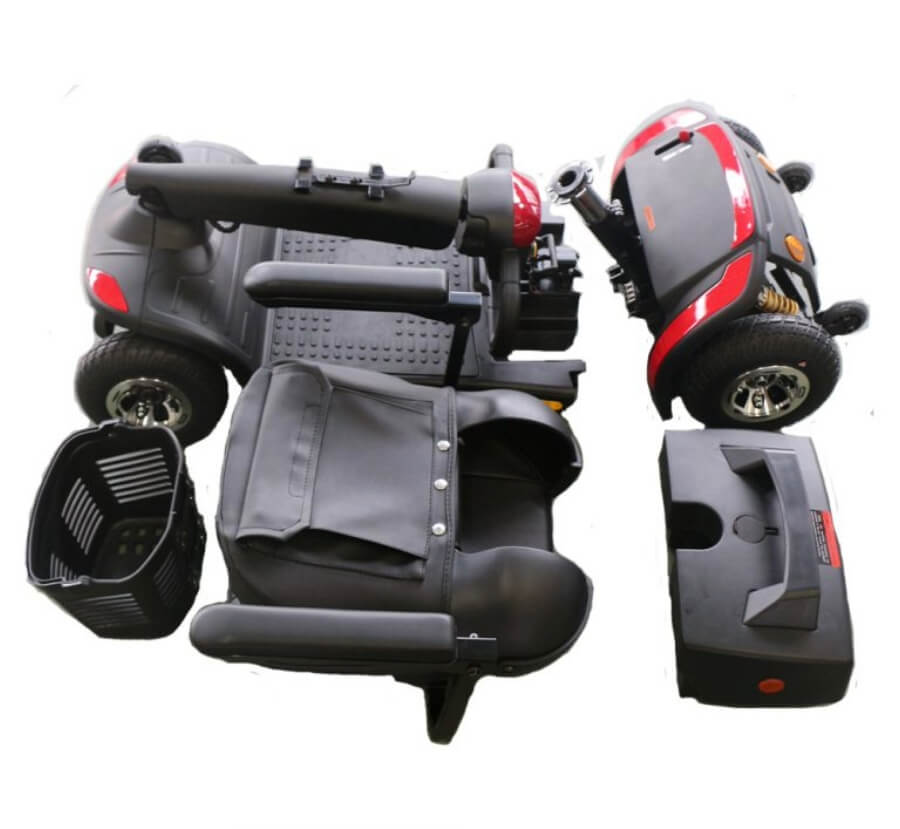A black and red mobility scooter with a plush seat, front basket, and LED headlights, designed for ease of transportability and comfort from Adaptive Equipment (Image 2).