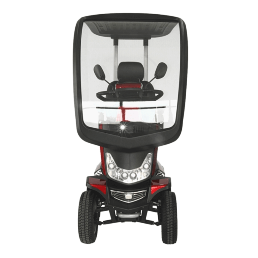 A high-performance mobility scooter with a black and white color scheme, featuring a clear weather canopy, a comfortable seat, and a shock-absorbing flexi tiller. It also shows off-road capabilities with front and rear suspension and left and right rear mirrors from Adaptive Equipment (Image 3).
